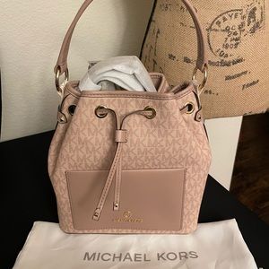 SOLD!!!Brand New w/tags Michael Kors Logo Maeve Bucket Messenger Bag w/dust bag.